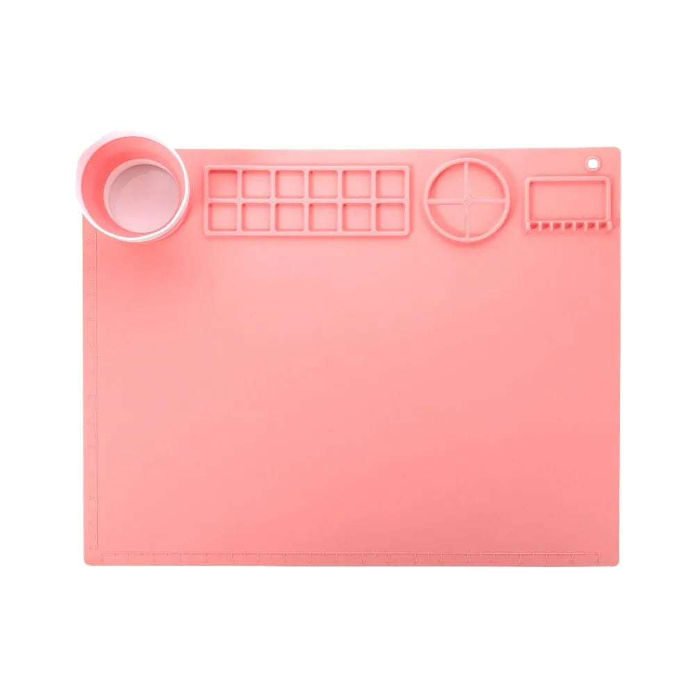 Silicone painting mat with optional mixing bowls for oil and watercolour artwork