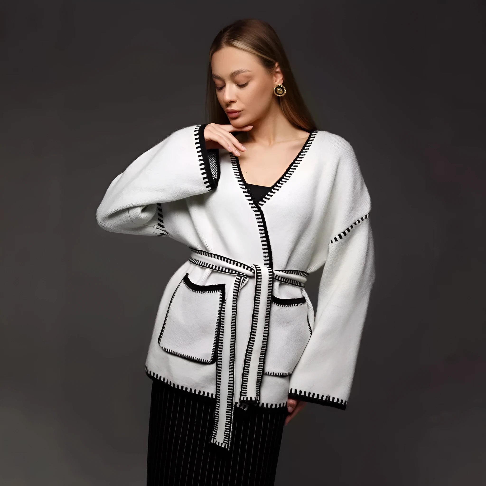 Loose fit knitted cardigan coat in imitation cashmere fabric showing front cardigan styling and long sleeves
