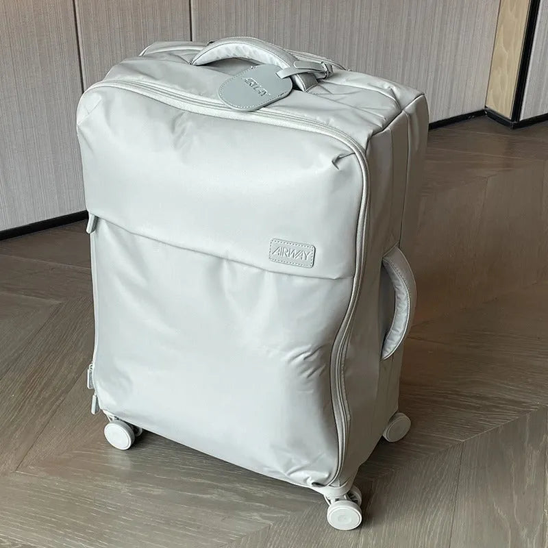 Ultra-light waterproof Oxford cloth suitcase in bluestone green colour with universal wheels
