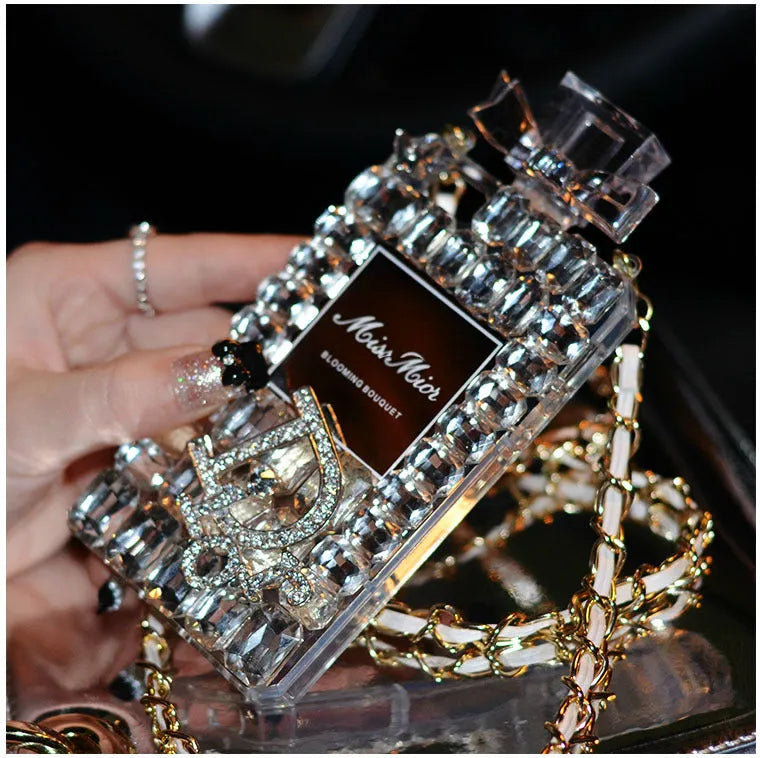 Perfume bottle bow design iPhone case with metal chain in black, gold, pink, or transparent colour