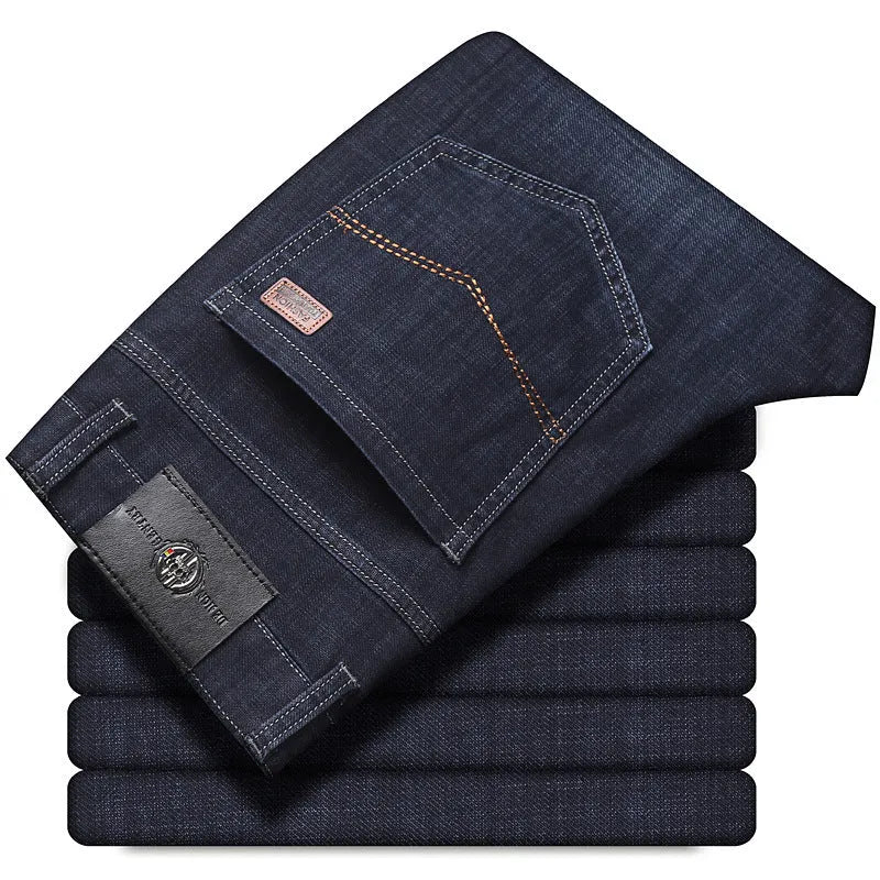 Straight leg stretch jeans in blue denim on a mid-waist model, showing zip fly and high elasticity fabric.