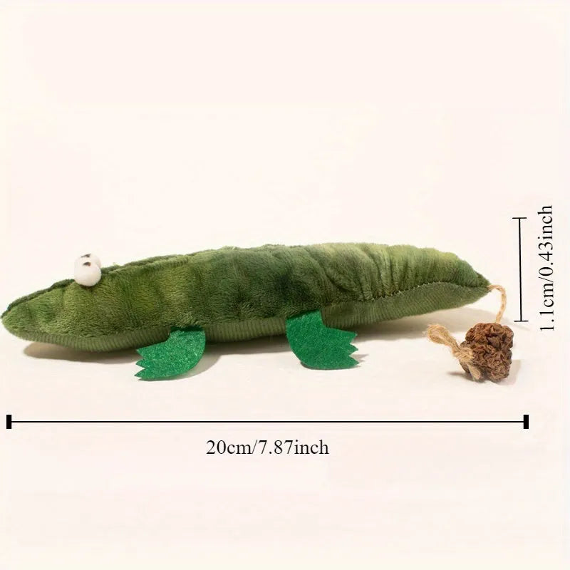Green plush alligator catnip toy with plant-based materials and peppermint scent