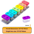 Large white plastic pill organiser box with 14 compartments, shown disassembled into separate sections.