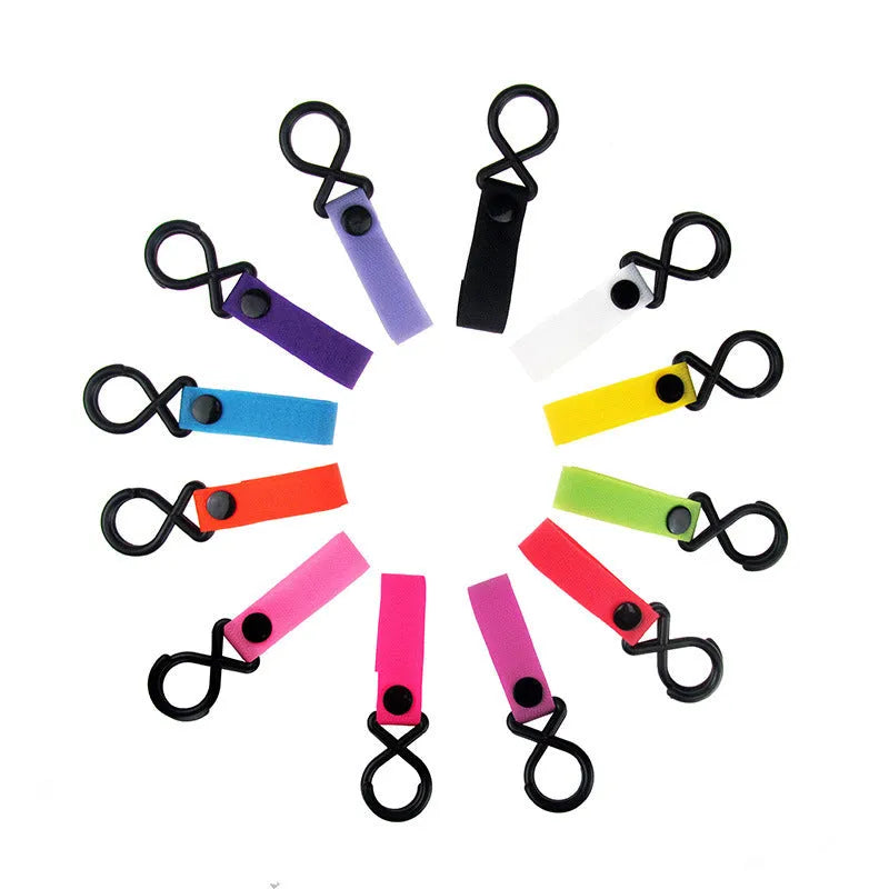 A single nylon Velcro hook for luggage organisation, shown in a selection of its 18 available colours.