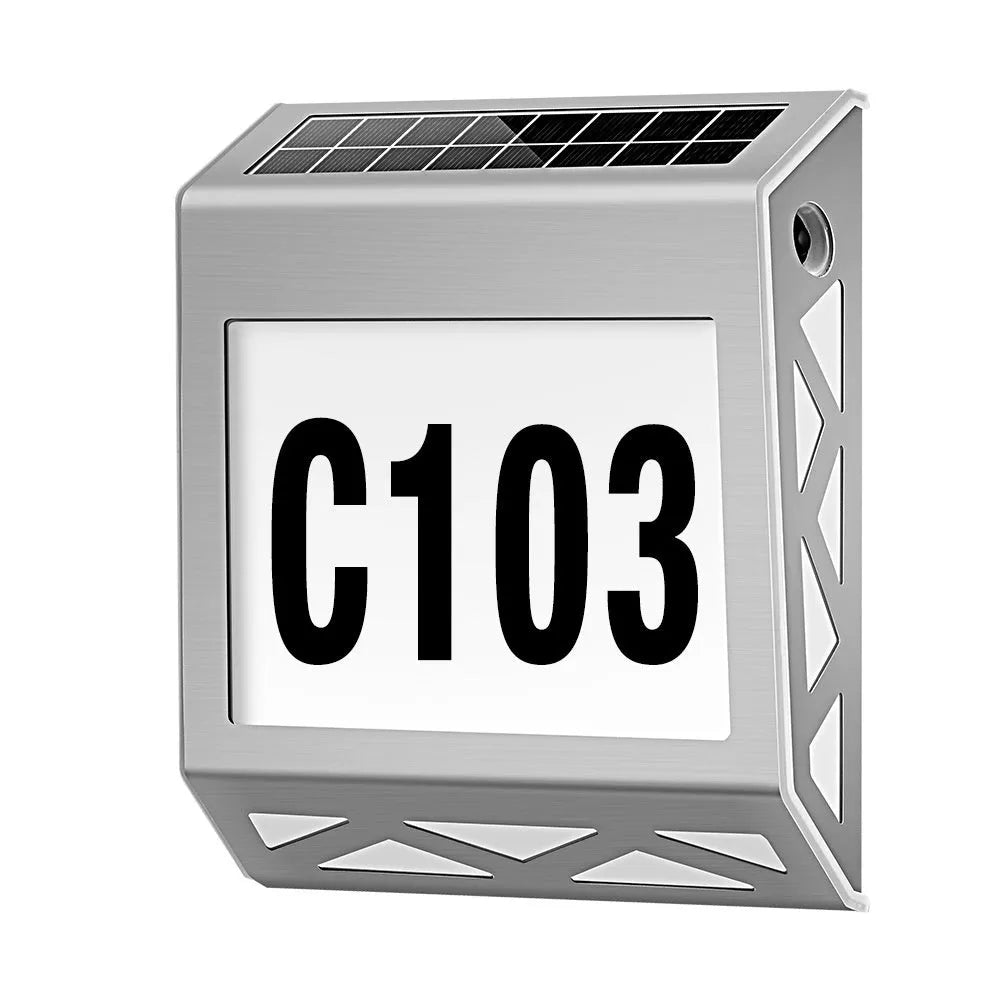 Solar-powered outdoor doorplate light with digital display showing house numbers