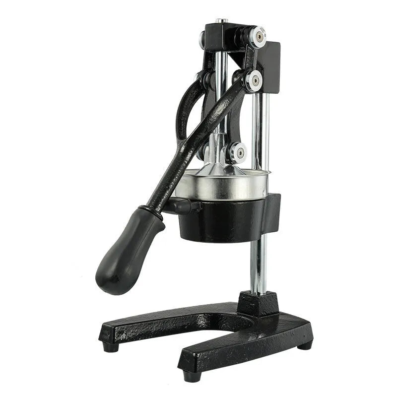 Black and white manual cast iron juicer with stainless steel funnel, 40 cm tall on kitchen counter.