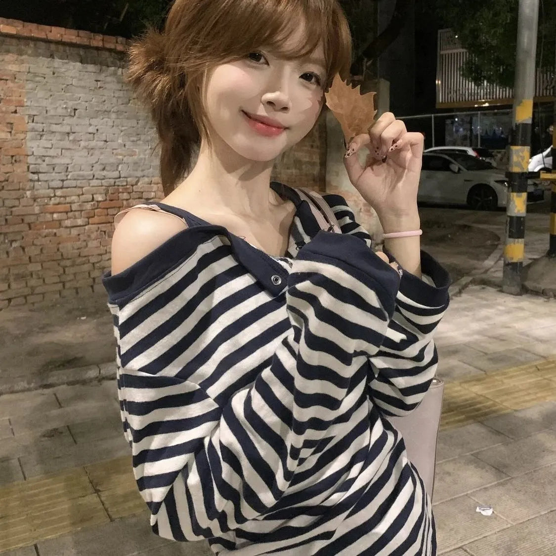 Dark blue Korean-style women's oversized t-shirt with embroidery details and long sleeves