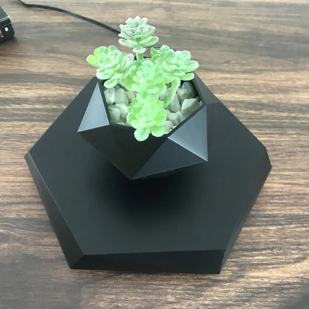 Hexagonal wood grain magnetic levitating flower pot floating above matching base