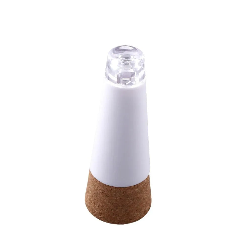 Plastic rechargeable LED luminous bottle cap cork light for decoration.