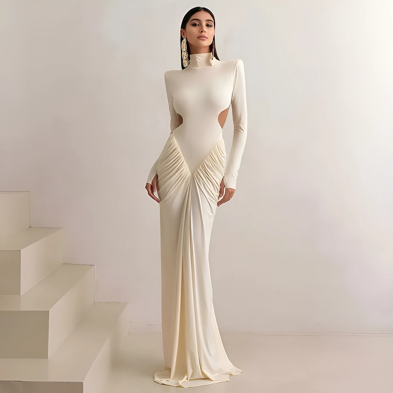 Women's high collar backless dress with long sleeves and pleated details in slim fit design