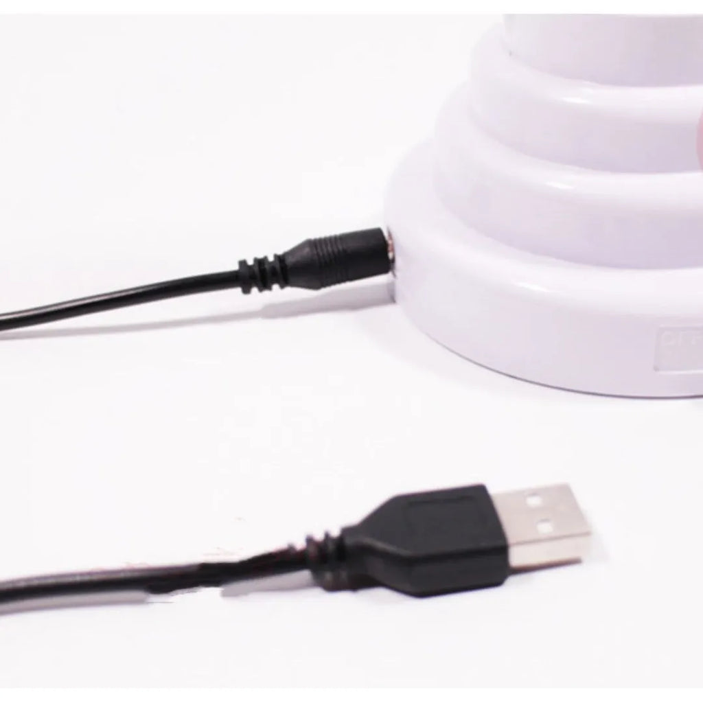 Handmade bamboo-shaped white and green USB desktop lamp in two sizes.