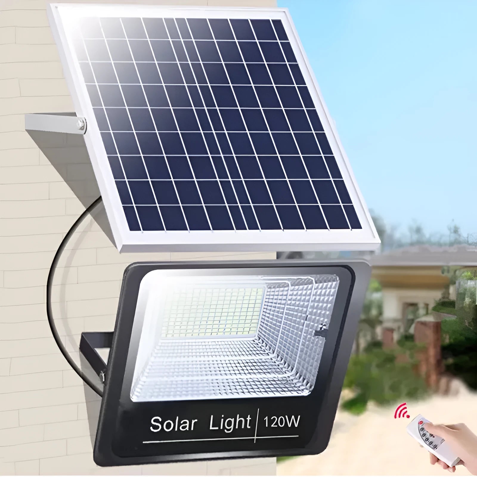 Black solar powered outdoor flood light with LED panels and remote control on a garden wall.