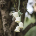 Green and white knitted wool car plant decoration with 8cm base and hanging rope