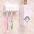 White adhesive wall-mounted toothbrush holder with pump on a bathroom tile.