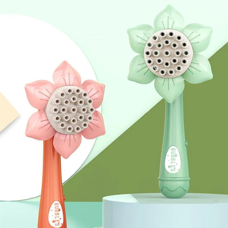 Sunflower shape plastic electric bubble blower toy in mint green colour on table