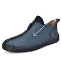 Men's black leather ankle boots with front zipper and round toe on rubber sole