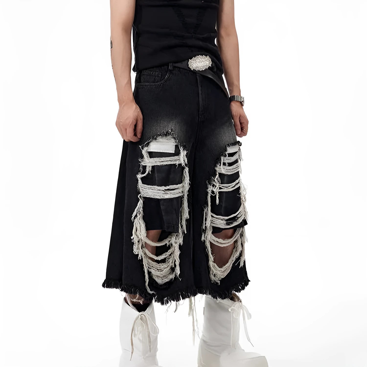 Black cropped wide-leg jeans with mid-high waist and distressed patch detail on micro-elastic denim