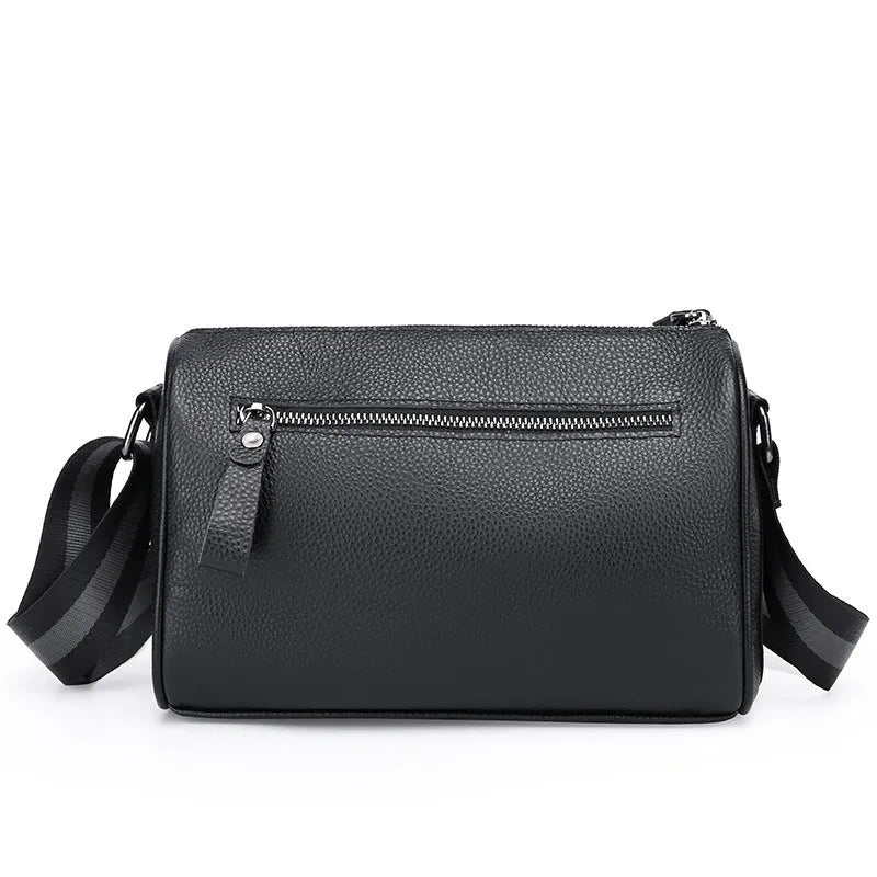 Black genuine leather one-shoulder crossbody bag showing 24cm width