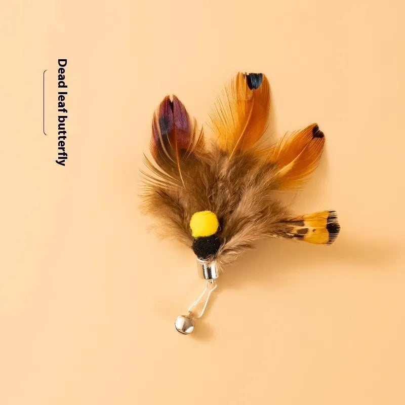Three small flying insect-shaped cat toy heads on steel wire stems, in assorted colours.