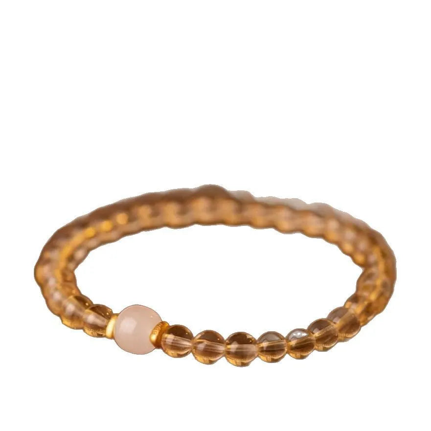 Natural rutilated quartz bracelet with gold inclusions, handmade Brazilian crystal jewellery