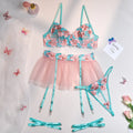 Pink women's mesh pettiskirt costume suit with matching bikini on a mannequin.