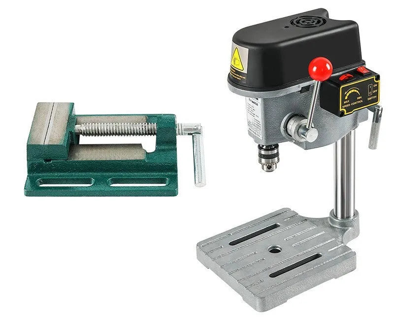 Bench-mounted drilling and milling machine with cross bench pliers and heavy-duty bench pliers.