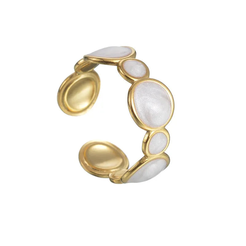 Adjustable geometric stainless steel ring with an electroplated finish for women.