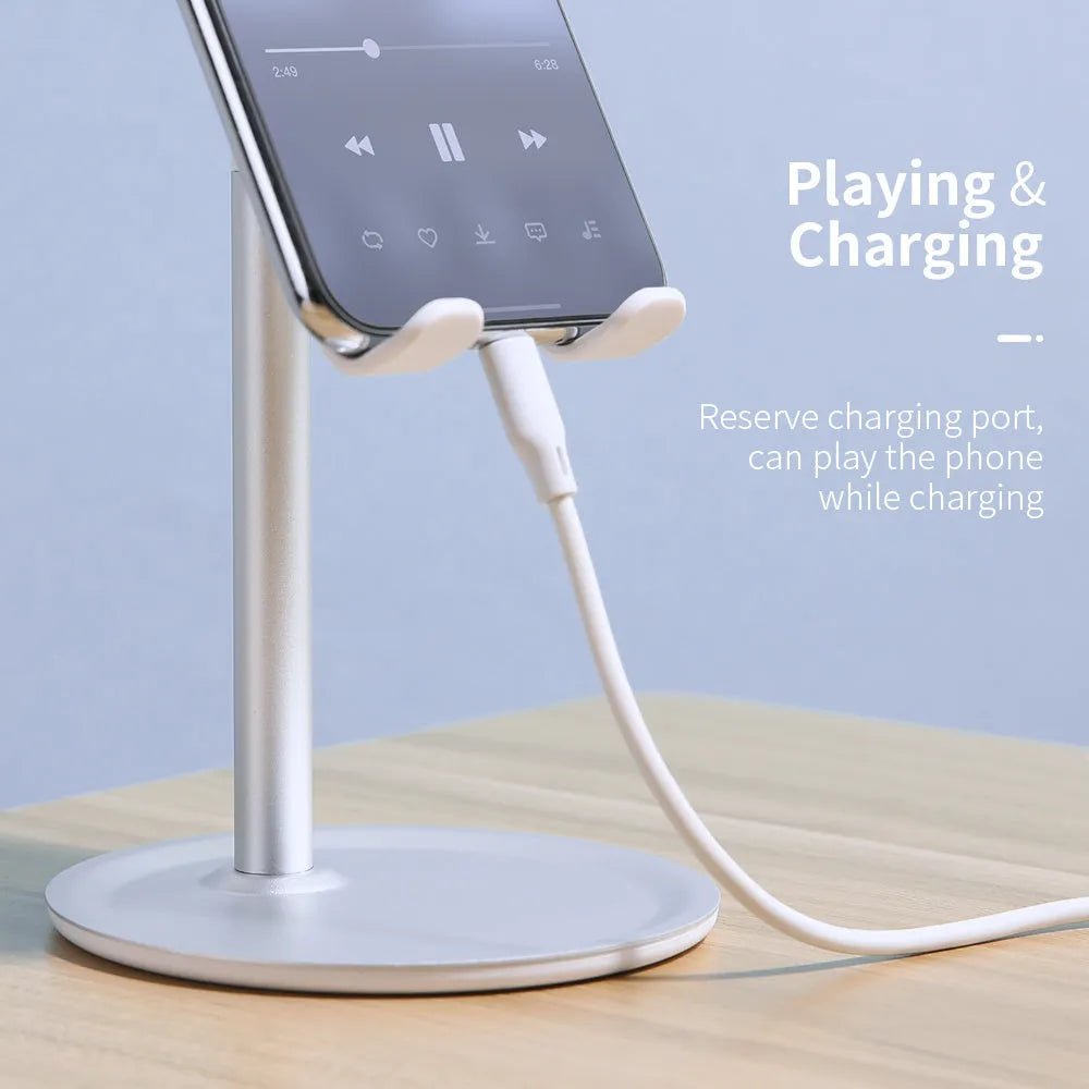 Silver white aluminium alloy mobile phone desktop stand holding a smartphone at an adjustable angle
