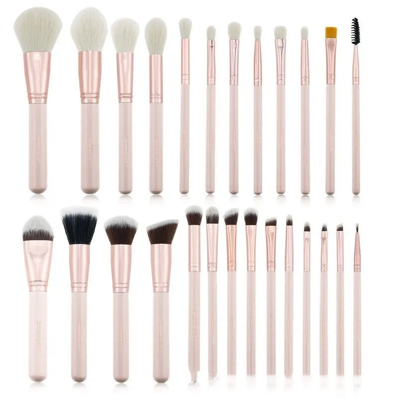 26 pink-handled makeup brushes with wool bristles in a pink PU case