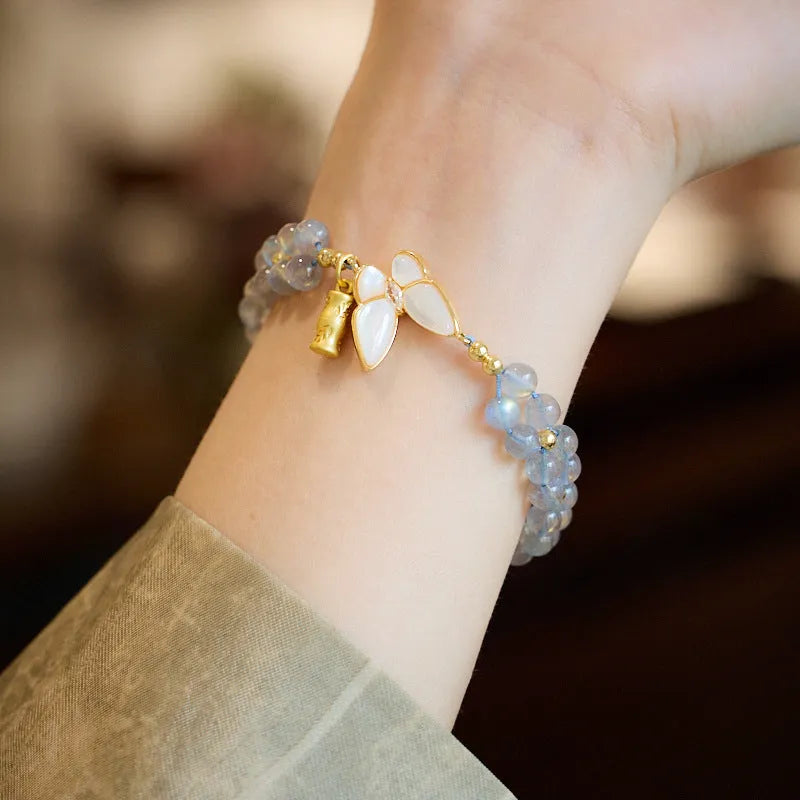Grey moonstone butterfly charm woven bracelet for women with geometric retro design