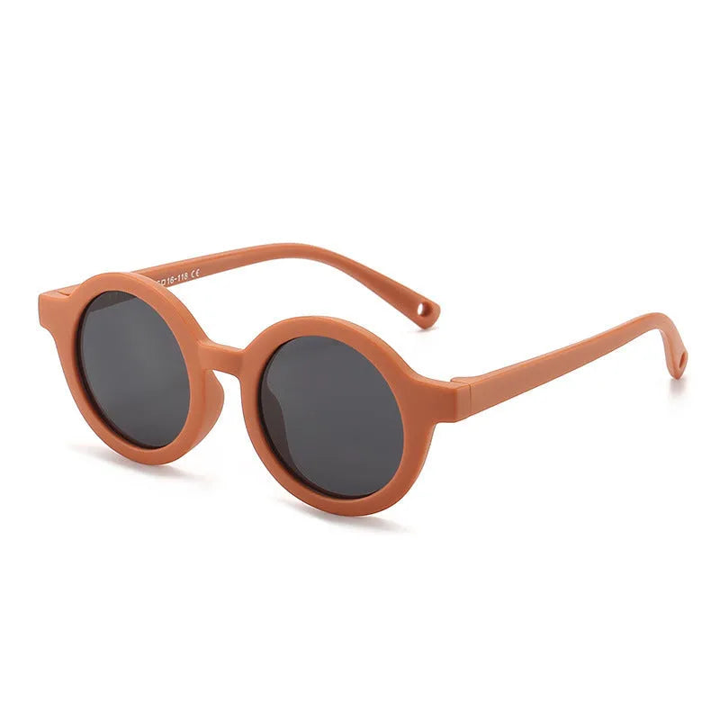 Children's silicone sunglasses with round full frame, UV400 polarised TAC lenses, and flexible TPEE construction for 0-3 year olds