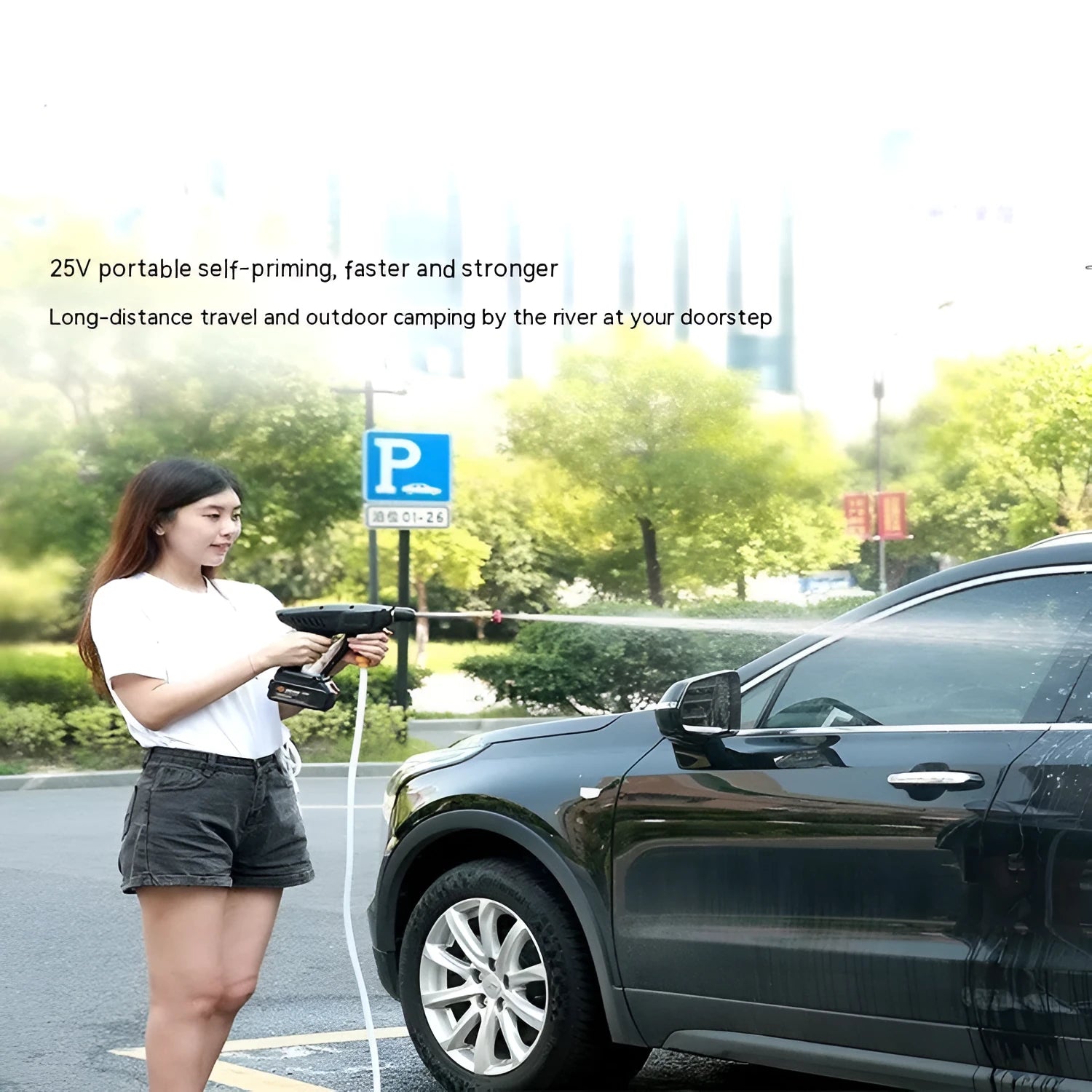 Wireless portable car washing machine with plastic gun and lithium battery on grass