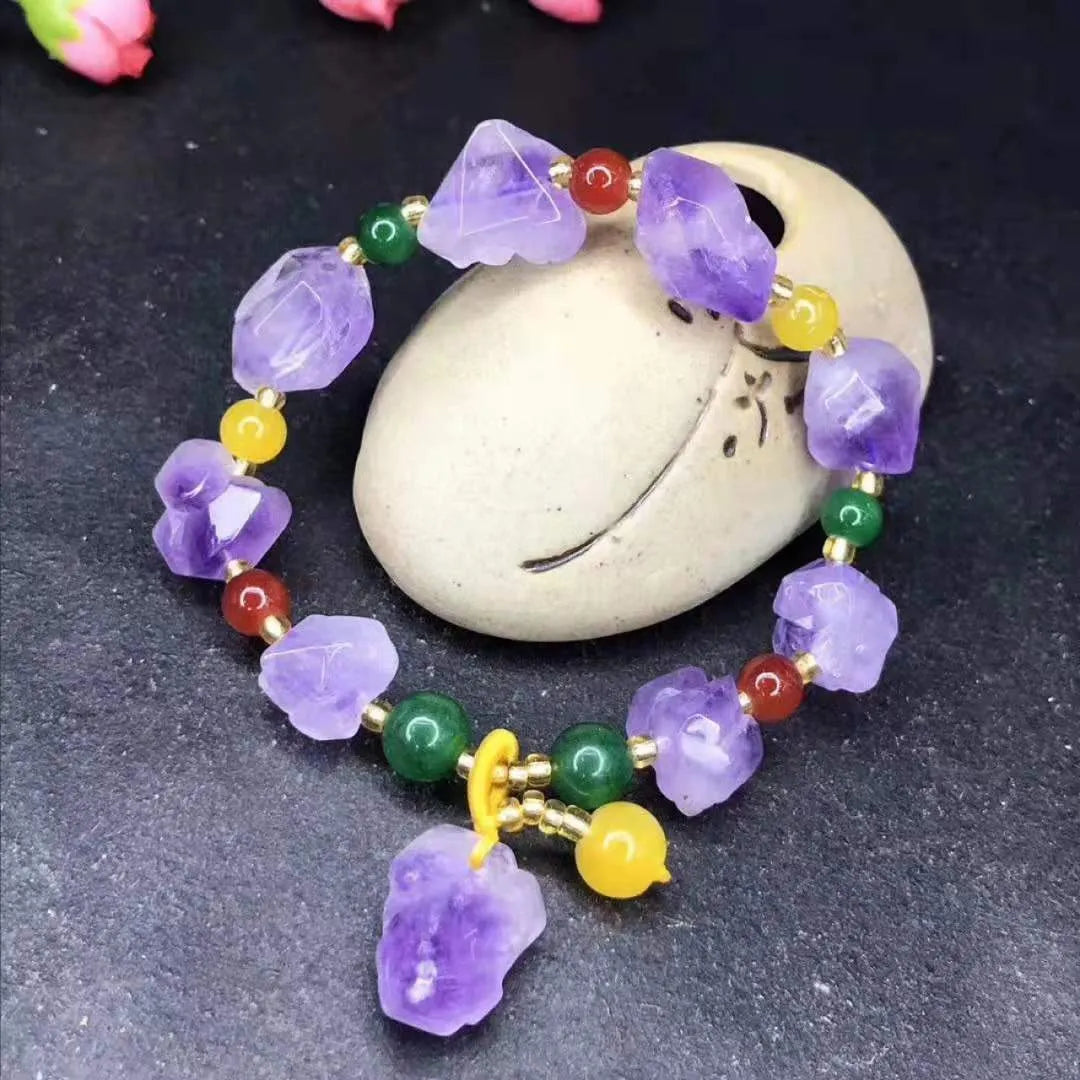 Natural style amethyst bead bracelet for women with a fu character charm.