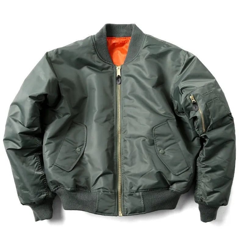 Man wearing a reversible army green nylon pilot jacket, showing the double-sided workwear design.