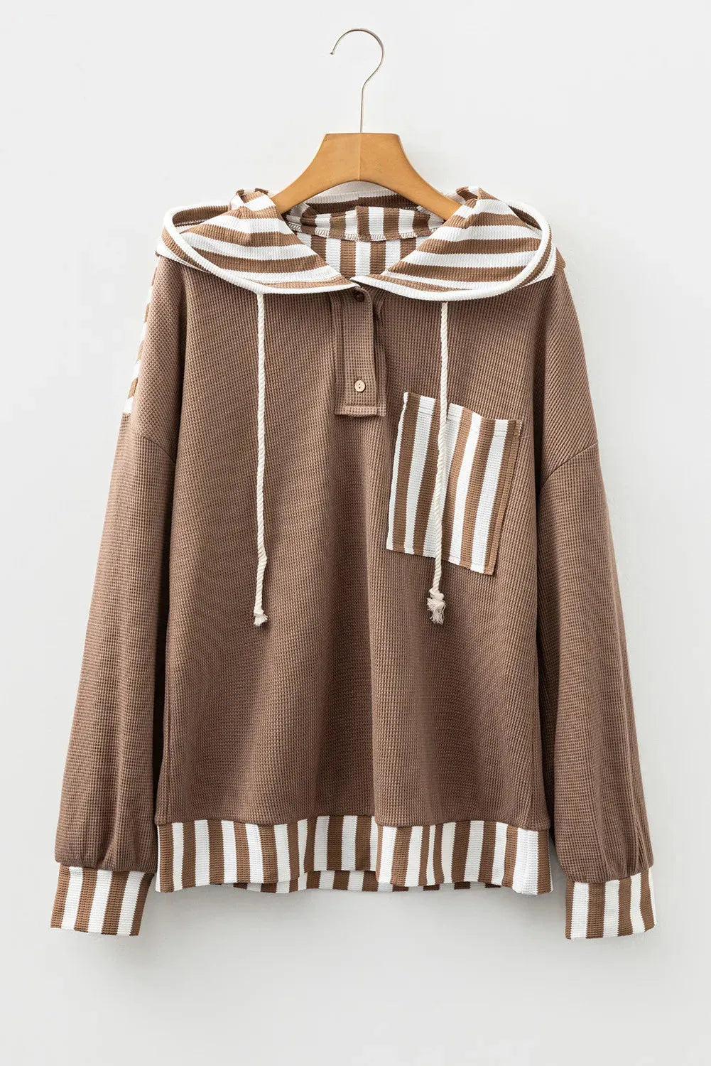 Straw yellow waffle texture striped patchwork hoodie with a button neck and drawstring hood.