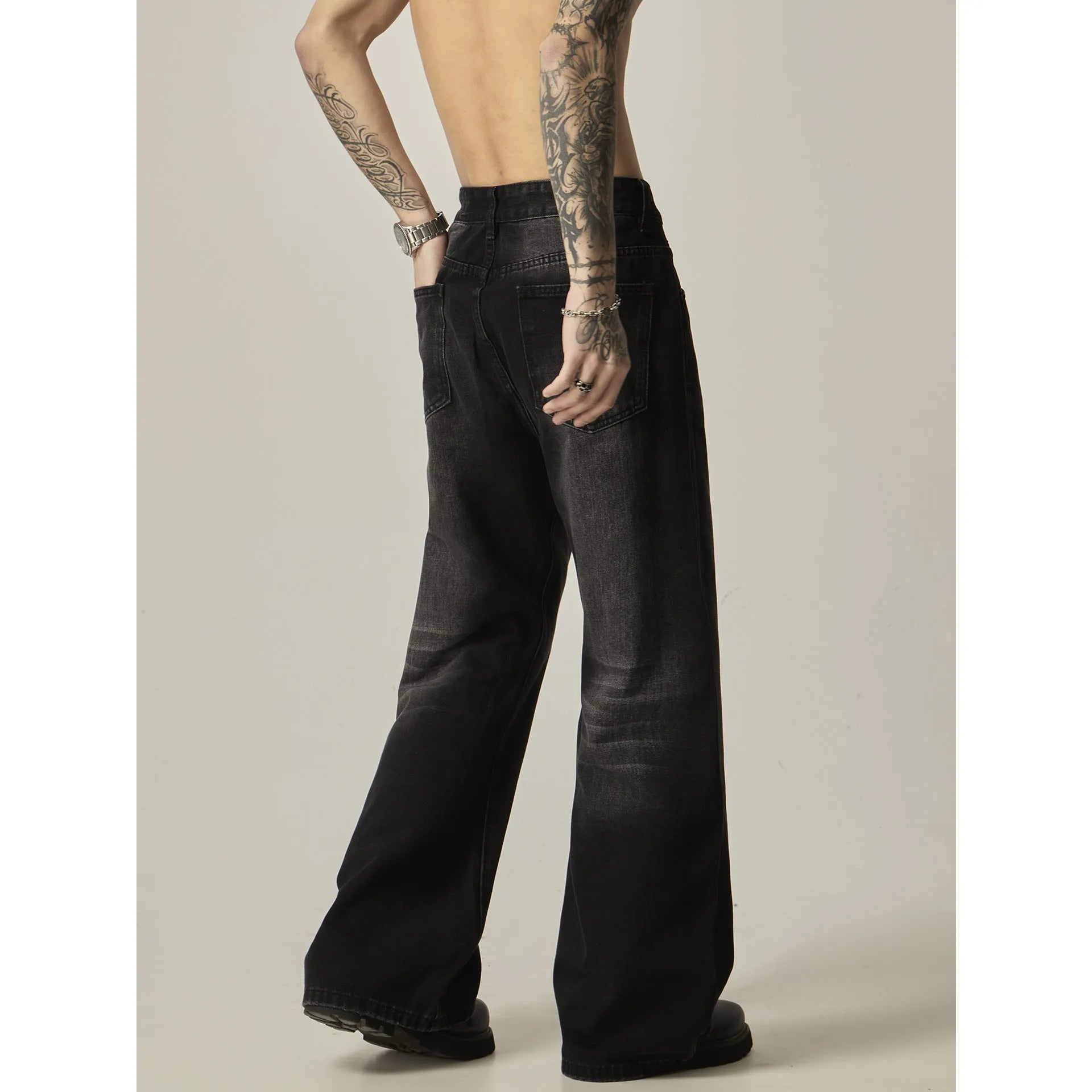 Black loose straight leg jeans with American retro styling and zipper fly
