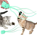 Green automatic electronic cat wand toy with swinging silicone tails on a 38cm wand.