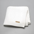Solid colour infant hug blanket with textured lines in beige khaki, size 70 by 90 cm.