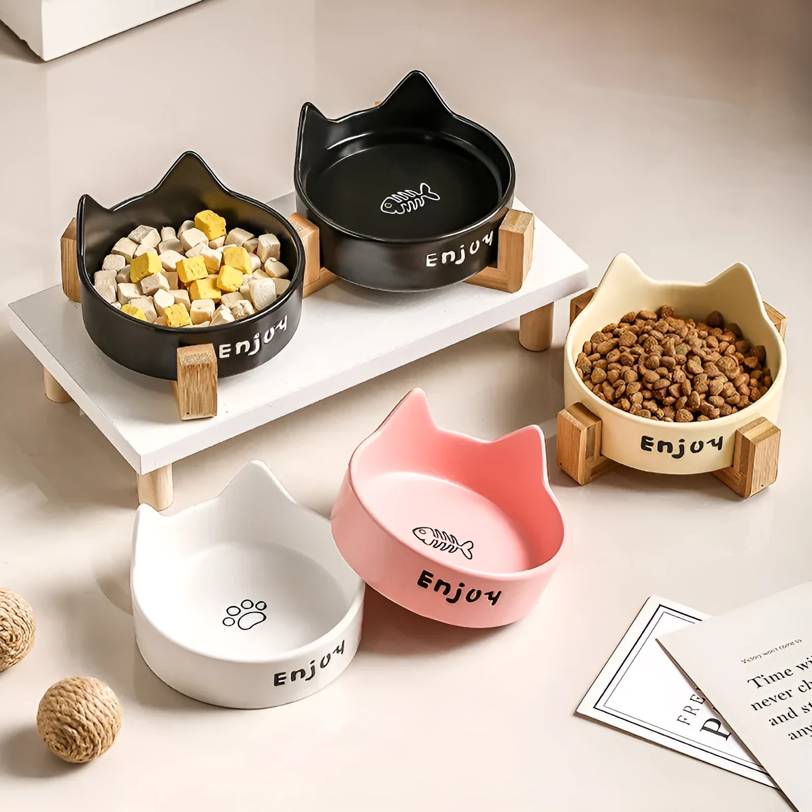 Porcelain cat bowls with wooden frame in cat ear paw design