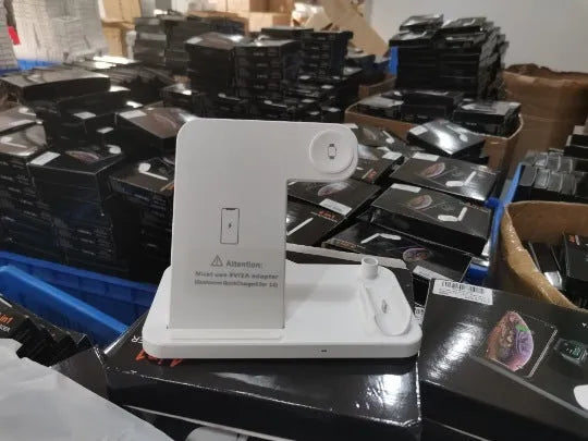 Folding 15W 4-in-1 wireless charger showing compact folded design and multiple device charging capability