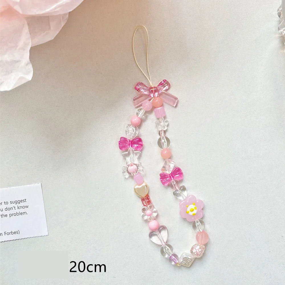 Beaded flower mobile phone lanyard in yellow, blue and pink colour options with plastic resin construction