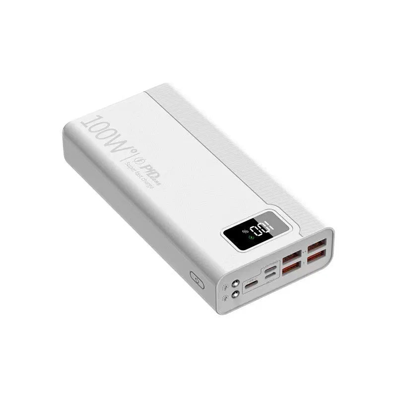 Black and white large capacity portable power bank with fast charging, showing size scale.