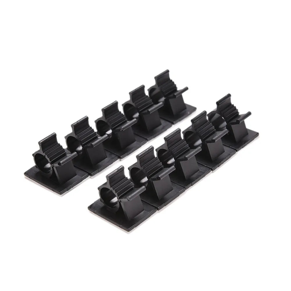 Ten black nylon adhesive cable clamps for wire management, showing two-stage lock design.