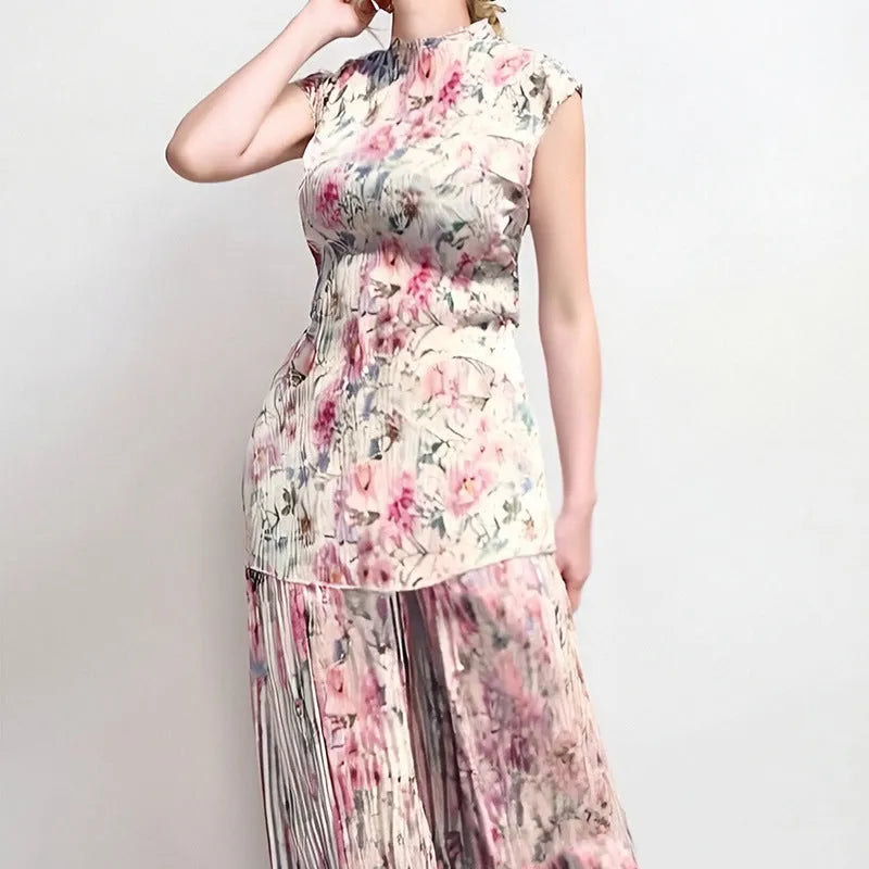 Women's long sleeve printed chiffon top paired with a high waist matching skirt.