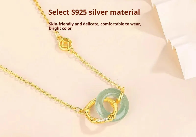 Sterling silver bamboo peace buckle pendant necklace with pearl accents on adjustable O-ring chain