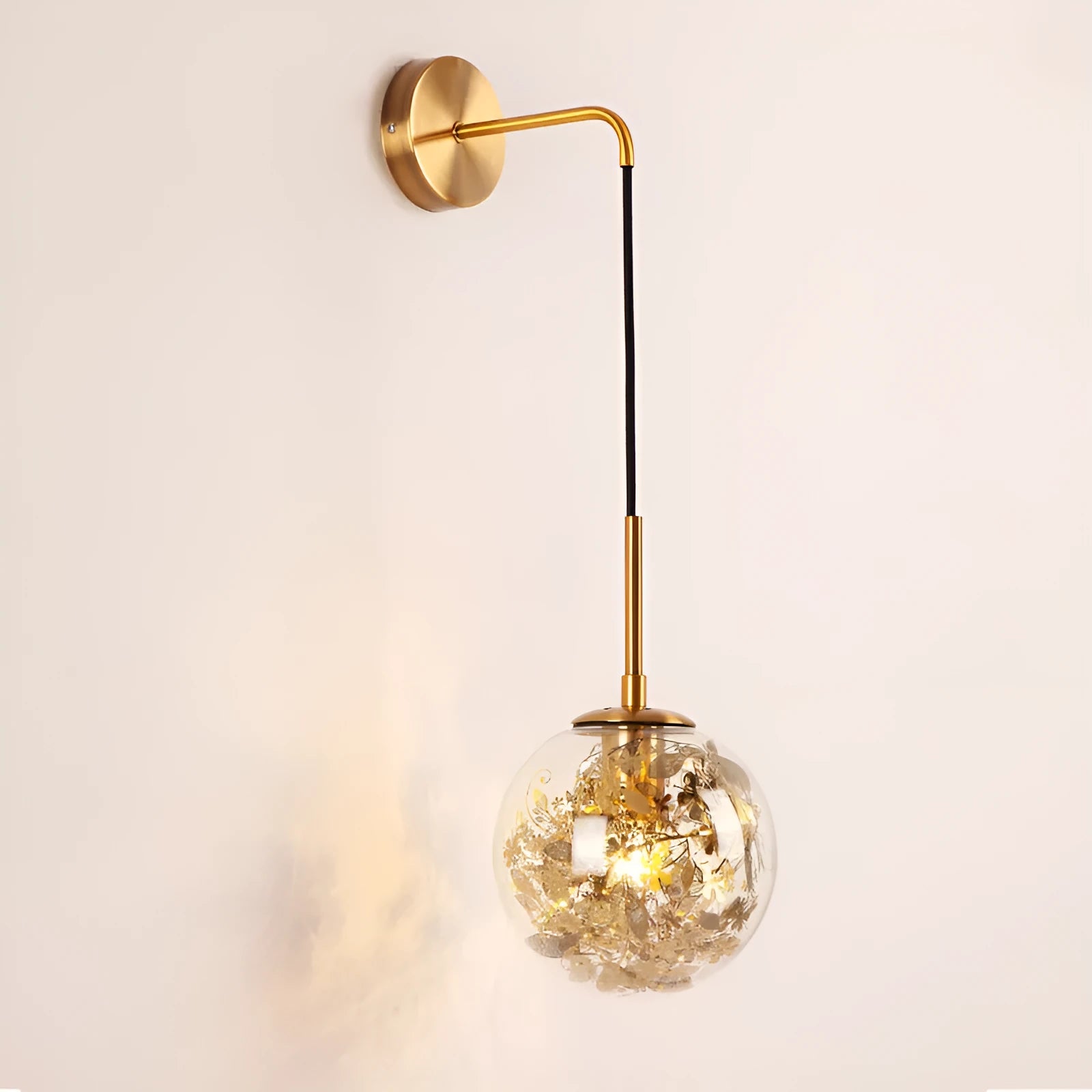 Modern glass wall lamp in golden flower or silver flower finish, shown in 15cm and 20cm sizes.