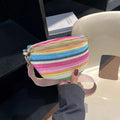 Blue bohemian straw beach bag with shoulder strap and shell shape design