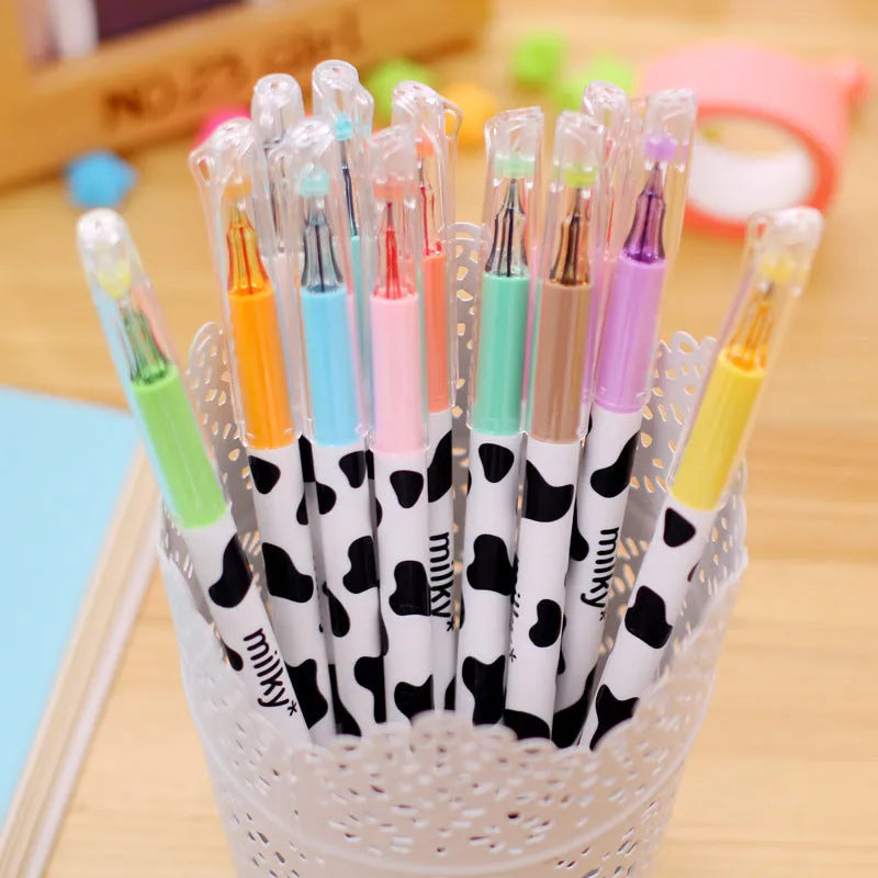 Set of 12 cow-colour gel pens with 0.38mm fine tips and plastic barrels.
