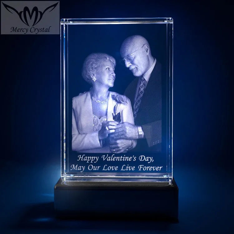 Custom laser engraved crystal sphere with personalised photo inside, available in multiple sizes and styles