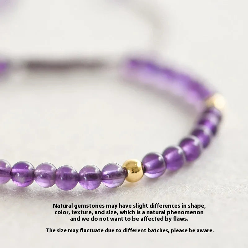 Handmade purple amethyst bracelet with 4mm stones and 14K gold clasp on wrist